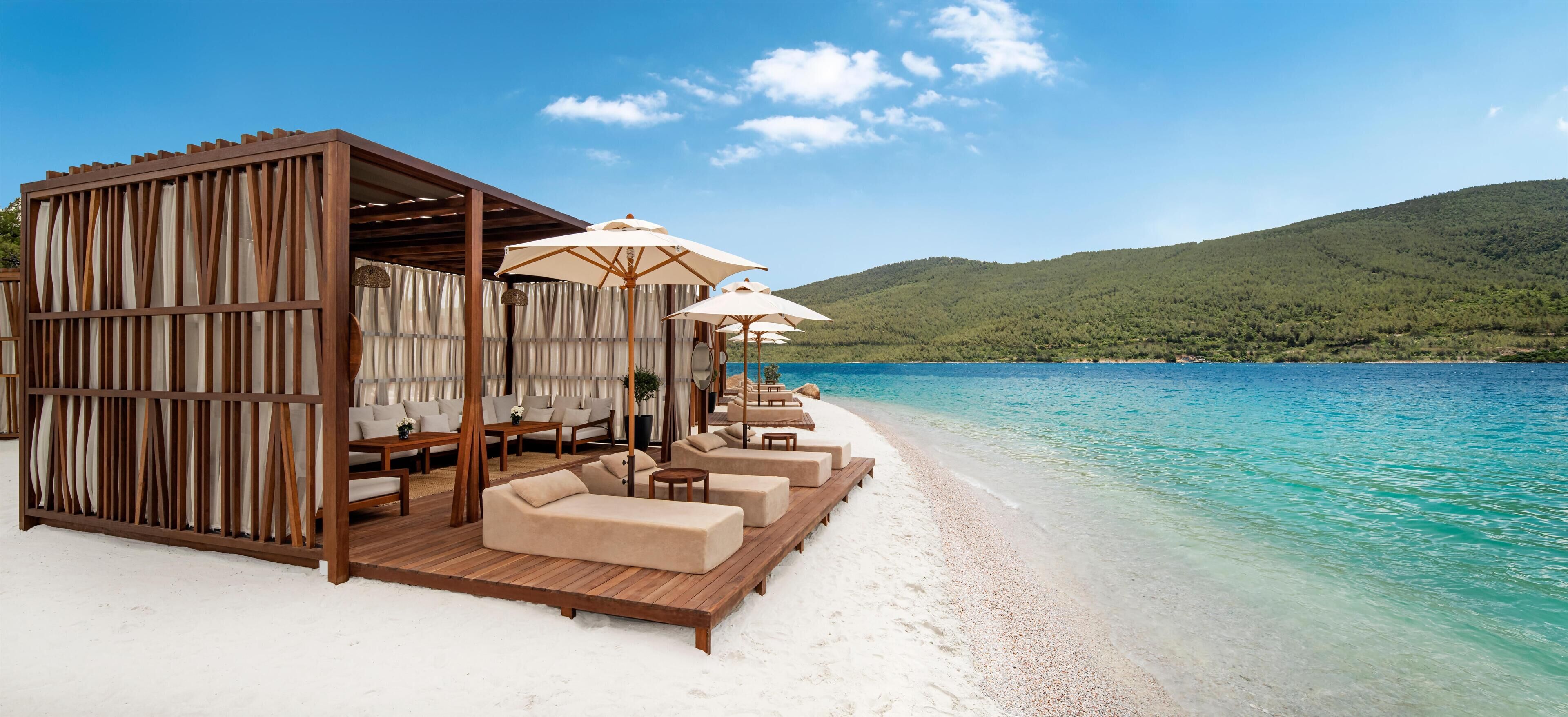 Private beach, white sand, beach cabanas, sun loungers