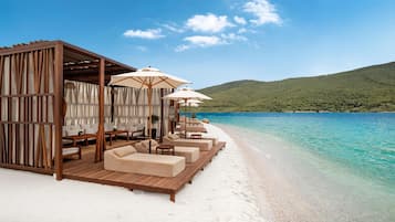 Private beach, white sand, beach cabanas, sun loungers