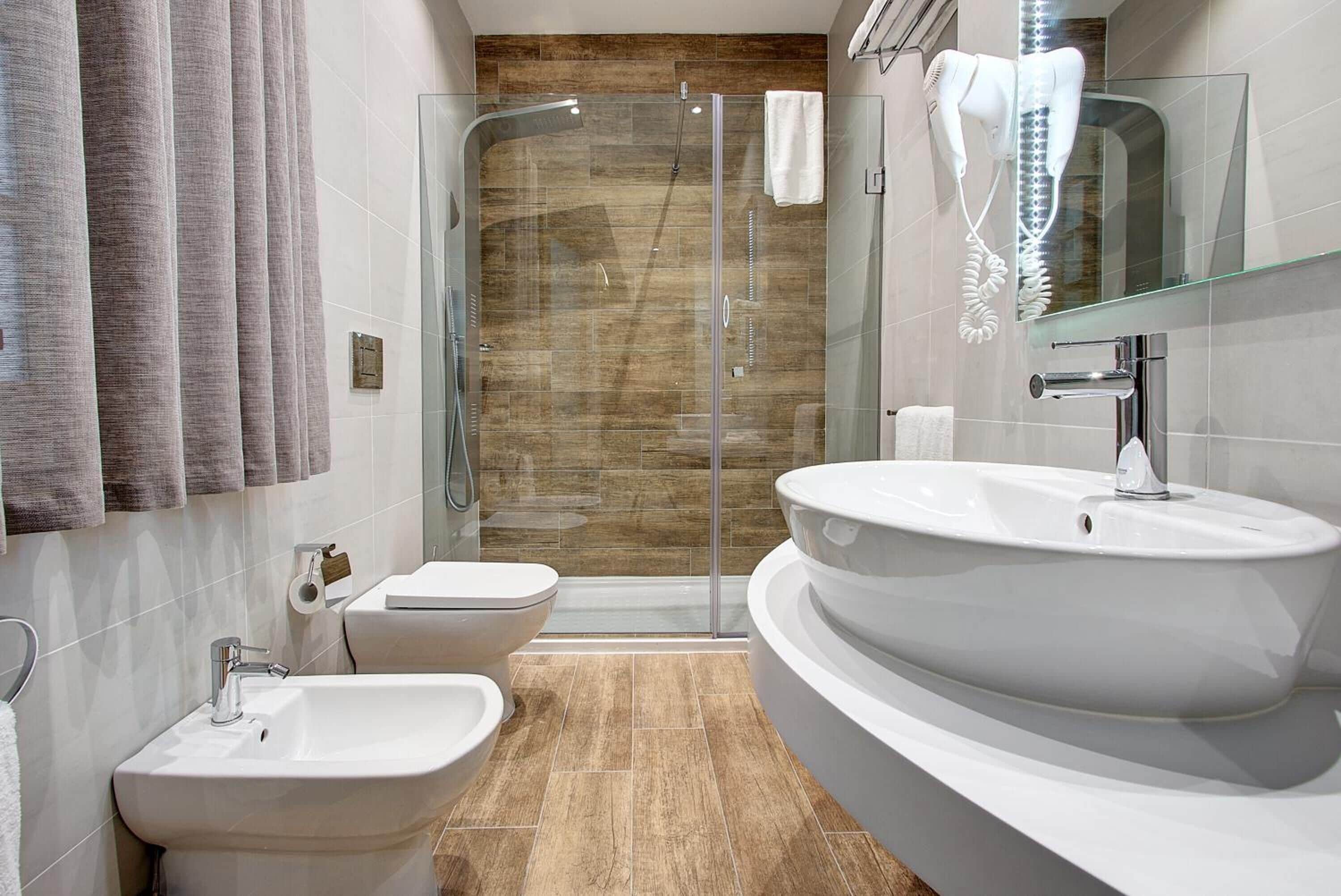 shower, free toiletries, bathrobes, slippers