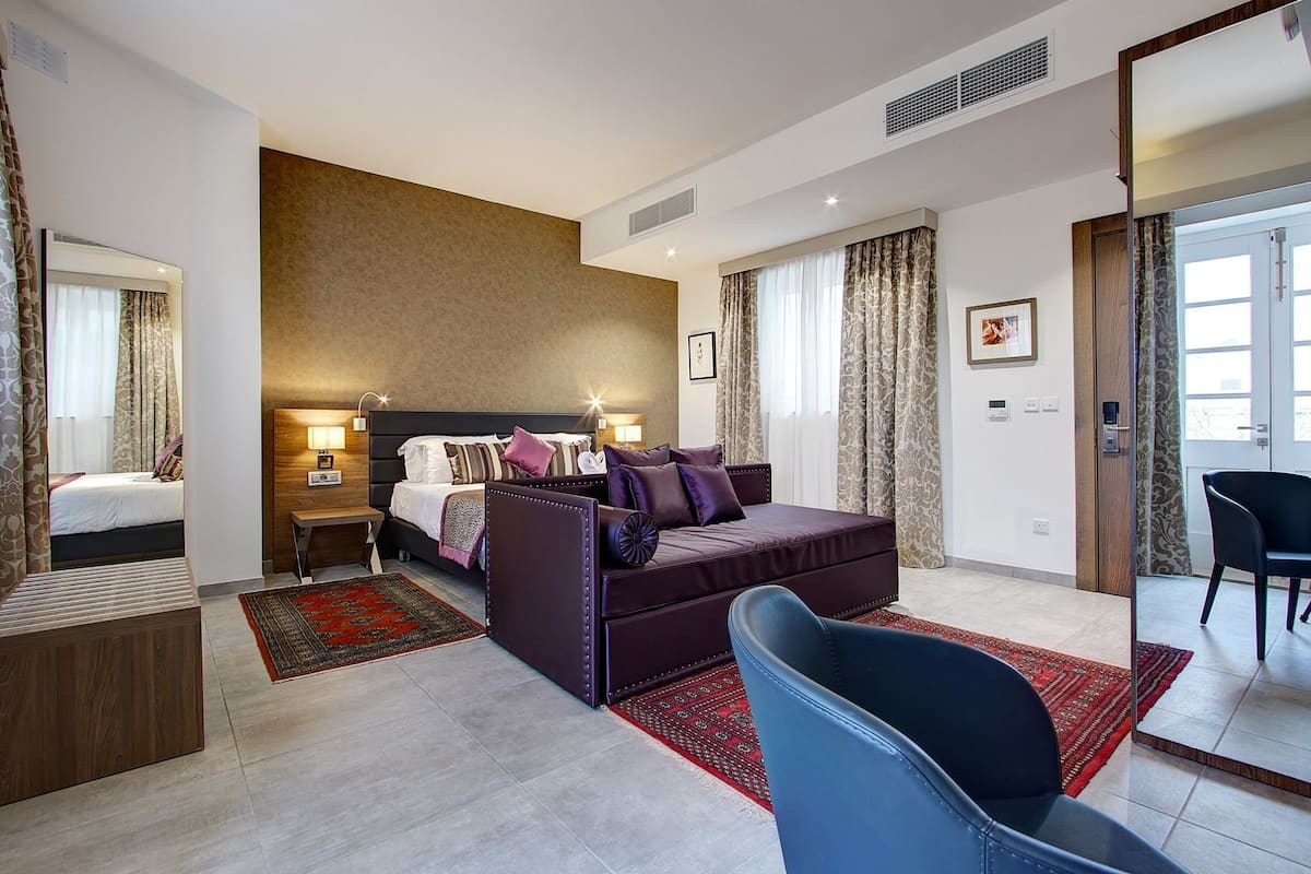 suite, terrace | minibar, in-room safe, desk, iron/ironing board