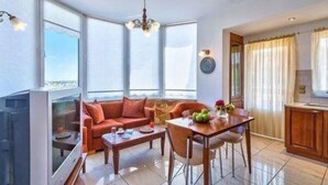 Panoramic Apartment, 2 Bedrooms, Smoking, Sea View | Living area | TV - Cactus Villa Apartments (Chania)