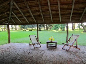 Deluxe Cabin, Garden View | Terrace/patio