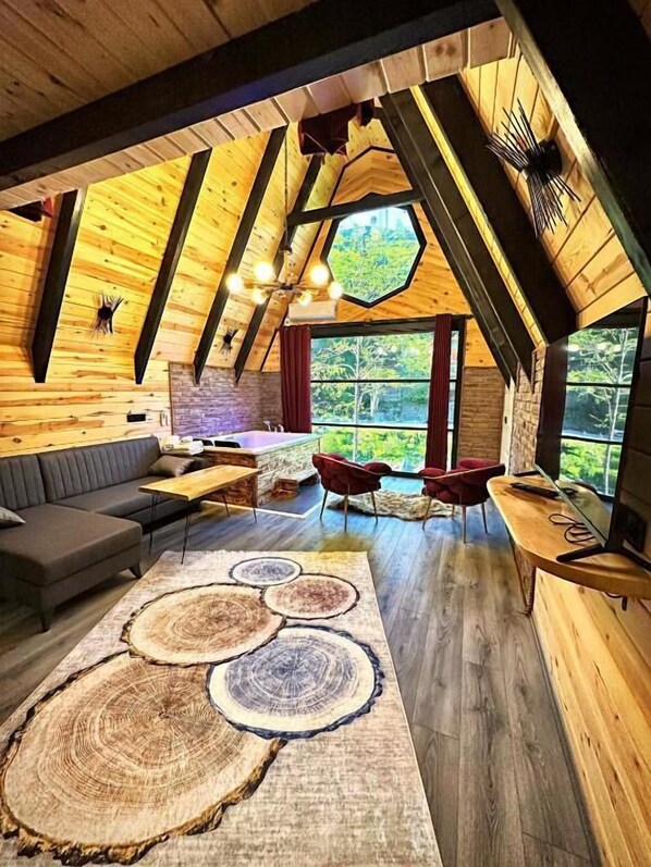 Luxury Suite, Jetted Tub, River View | 1 bedroom, premium bedding, minibar, in-room safe