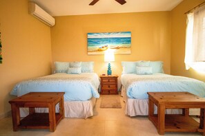 Economy Condo, 2 Bedrooms, Beachside | 2 bedrooms, in-room safe, iron/ironing board, cots/infant beds - Capri 1C by NAS (Playa del Carmen)