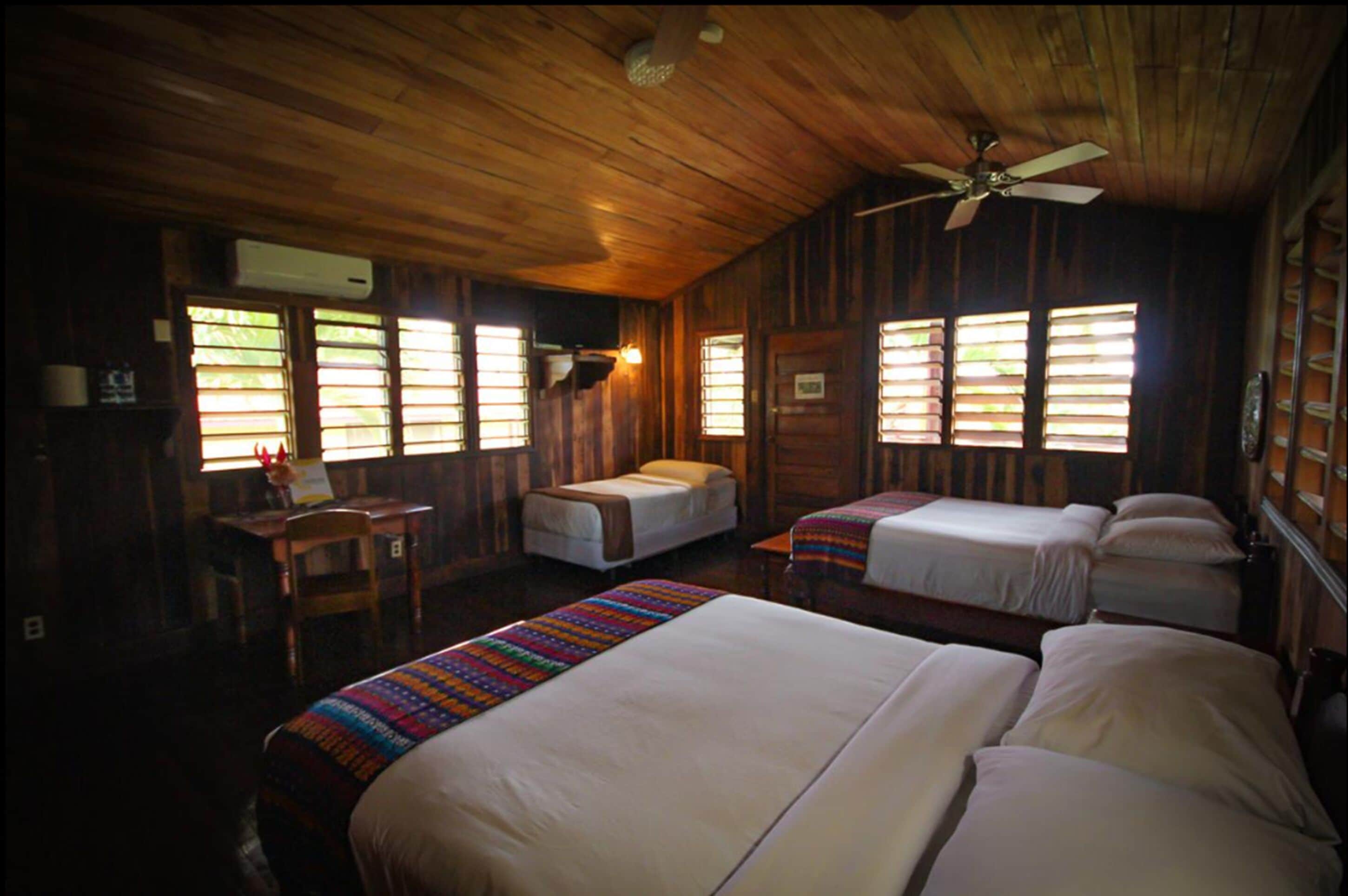 family studio suite, 1 bedroom, pool access, garden view | in-room safe, iron/ironing board, free wifi, bed sheets