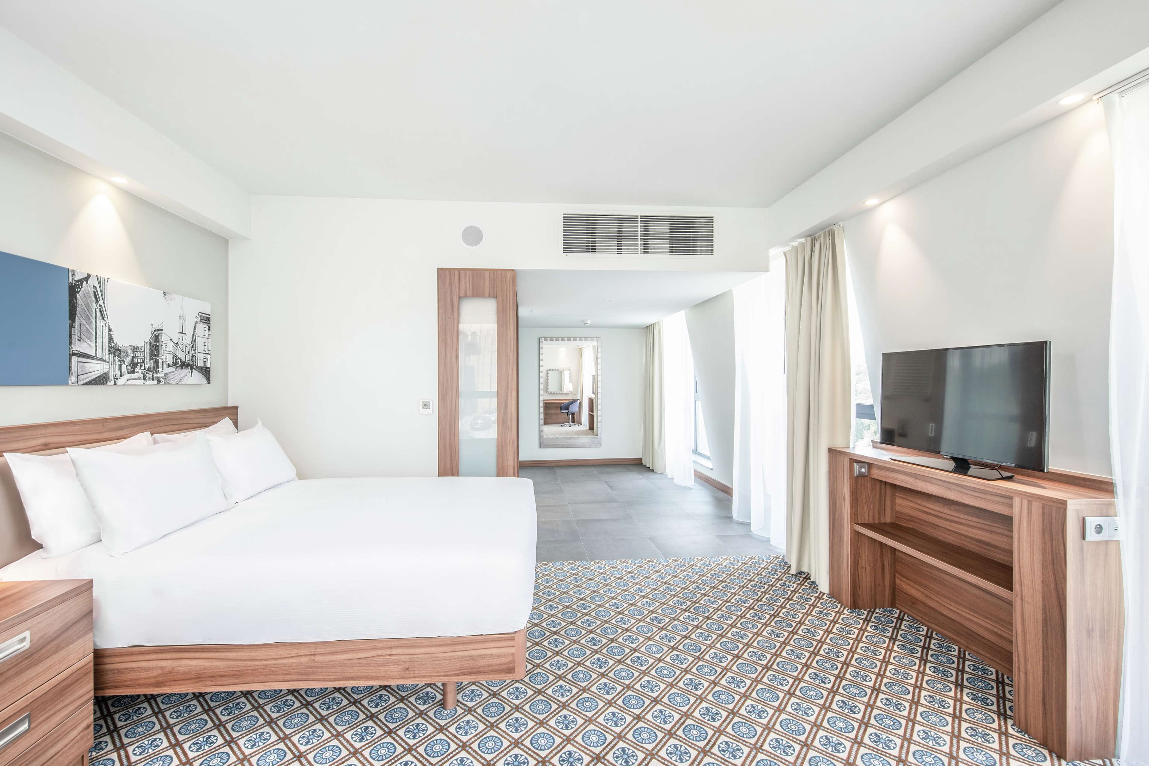 Habitació, 1 llit de matrimoni, accessible | Roba de llit d&#x27;alta qualitat, caixa forta a l&#x27;habitació i escriptori 