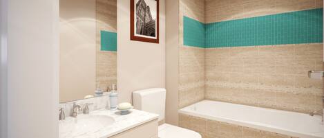 A bathroom with a marble sink, a toilet, and a bathtub.