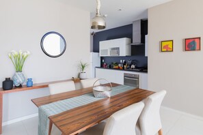 Business Apartment, 1 Bedroom | Living room | 45-inch flat-screen TV with cable channels, TV, Netflix