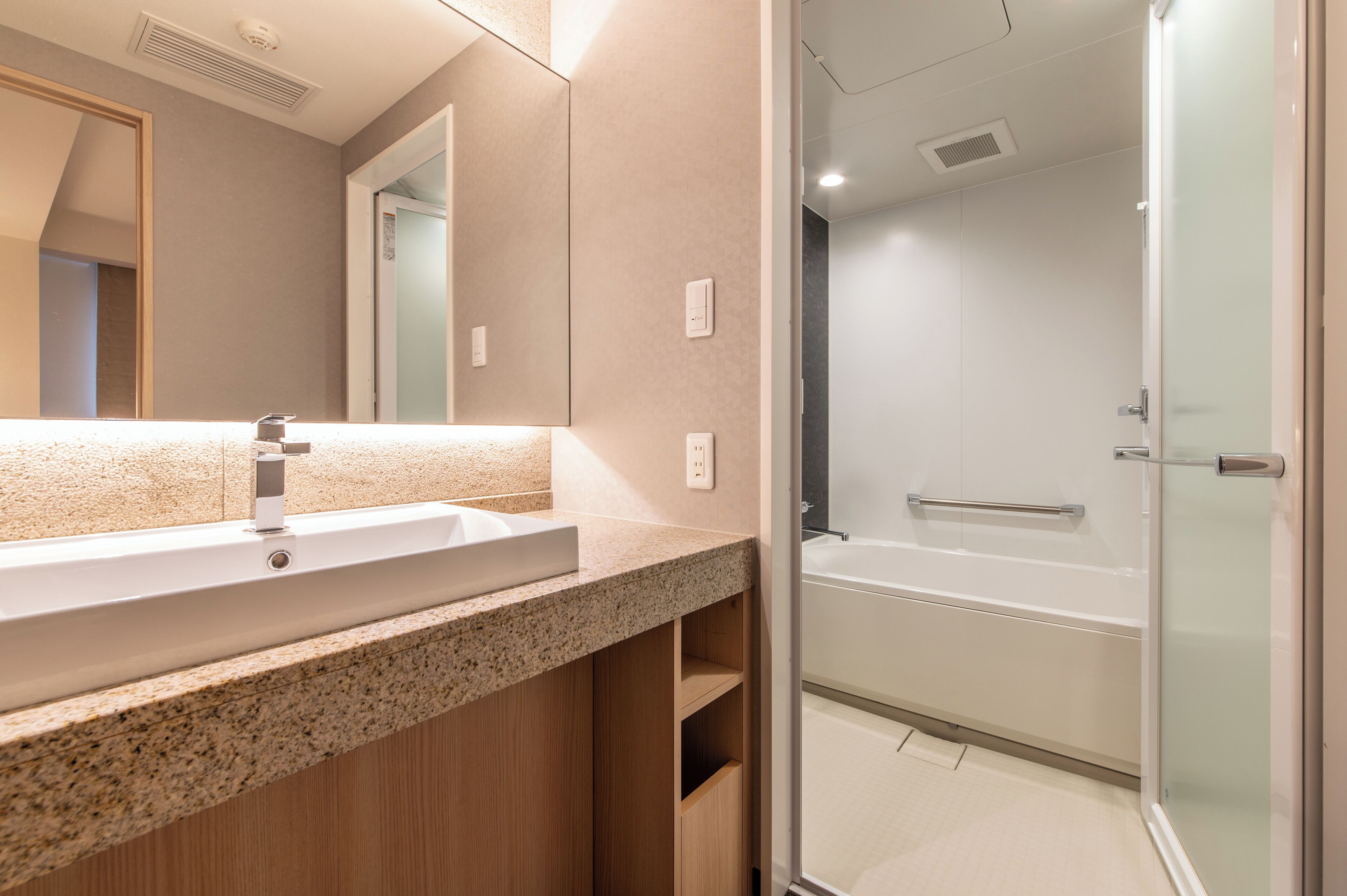 deluxe twin room (for 1-3 people) | bathroom | shower, free toiletries, hair dryer, slippers