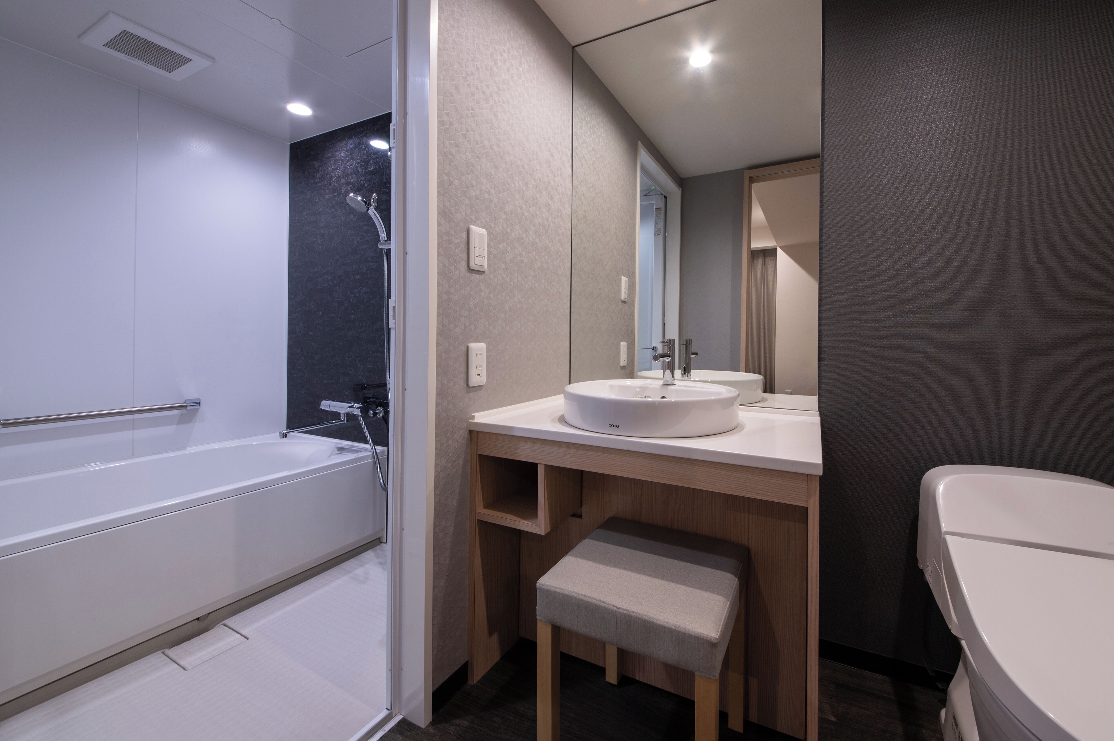superior twin room | bathroom | shower, free toiletries, hair dryer, slippers