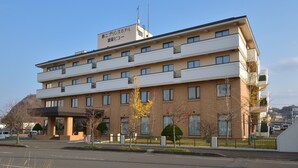 A multi-story hotel with a flat roof, multiple balconies, and a sign indicating it is a business hotel. - PRINCE HOTEL Second View MURORAN (Muroran)