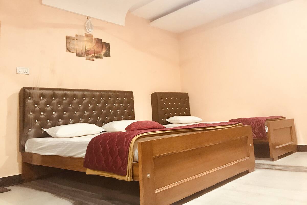 Chambre Triple Deluxe, plusieurs lits