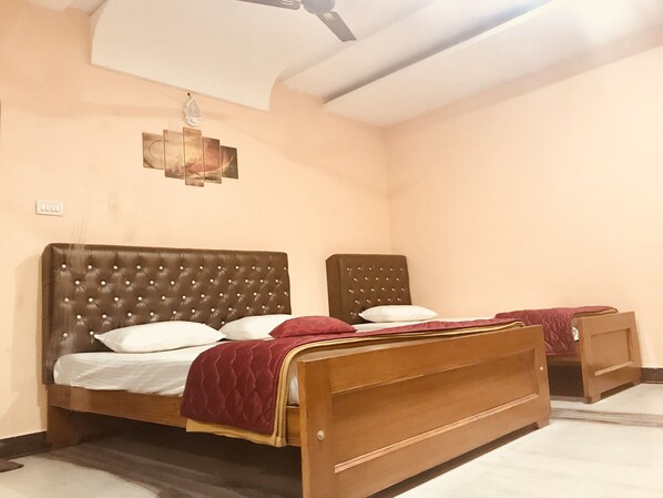 Chambre Triple Deluxe, plusieurs lits