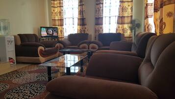 Executive Villa, 3 Bedrooms | Living room | Flat-screen TV