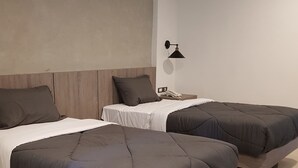 A modern hotel room with two beds, a bedside table, a lamp, and a phone. - Sabai@Chiang Rai (Chiang Rai)