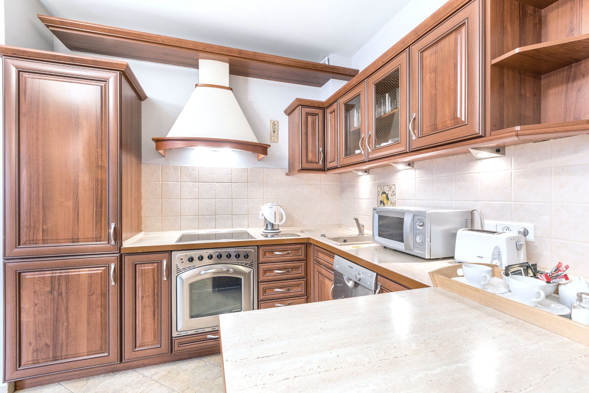 apartment, 2 bedrooms, balcony, mountain view | private kitchen | fridge, microwave, stovetop, dishwasher