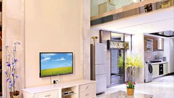 Deluxe Double  Loft | Living area | 40-inch flat-screen TV with cable channels, TV