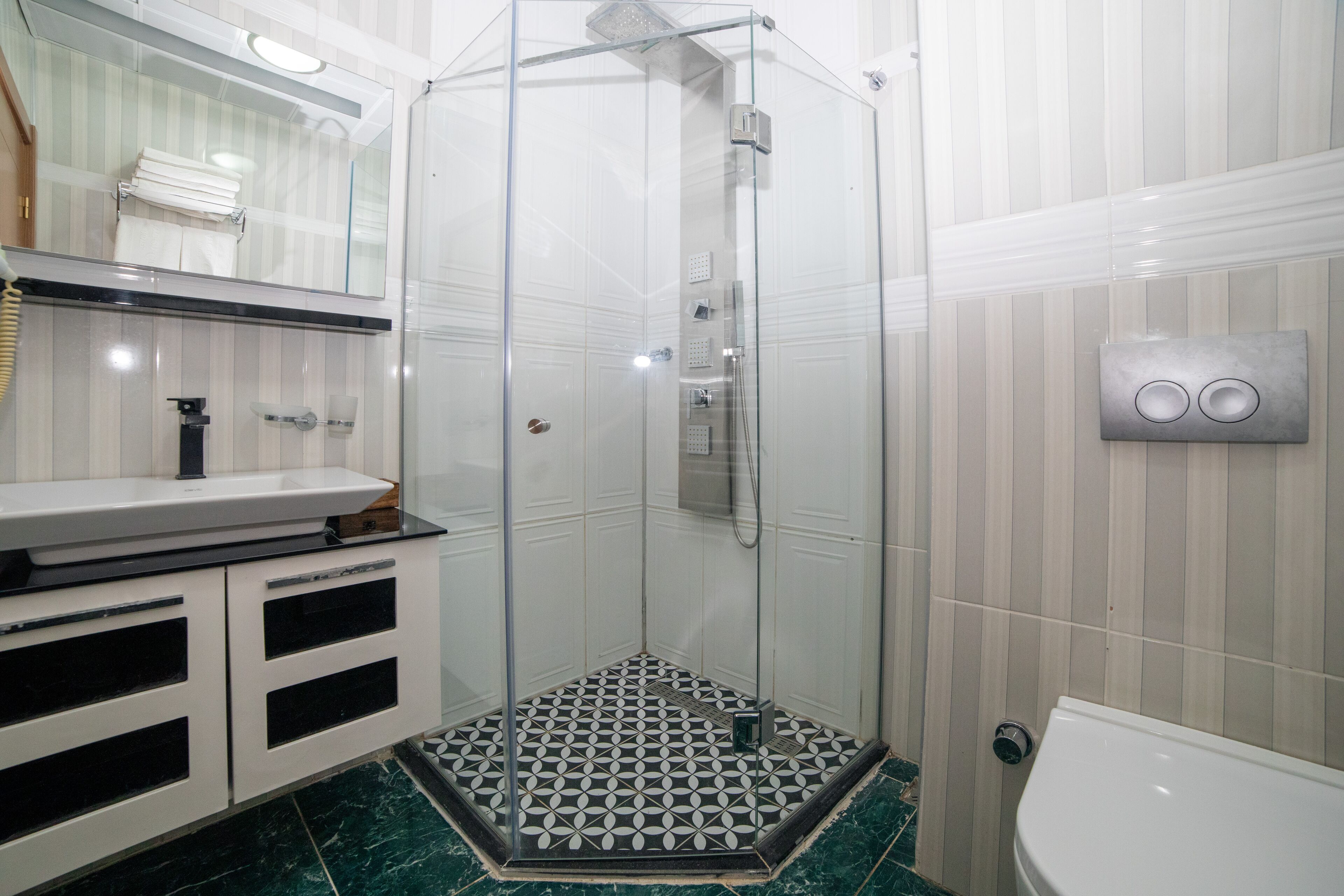 shower, free toiletries, hair dryer, bathrobes