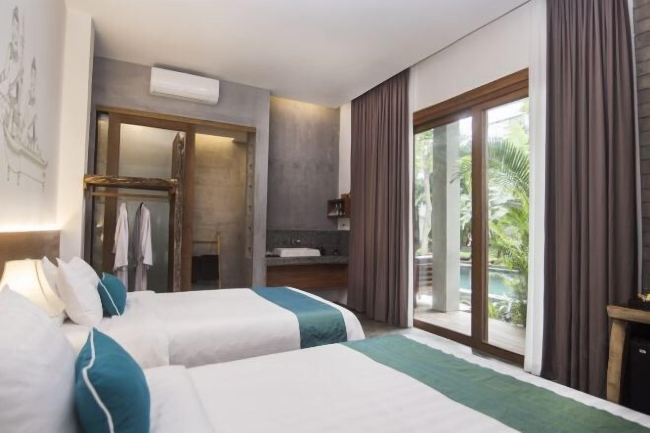 Luxe beddengoed, een minibar, een kluis op de kamer, een bureau