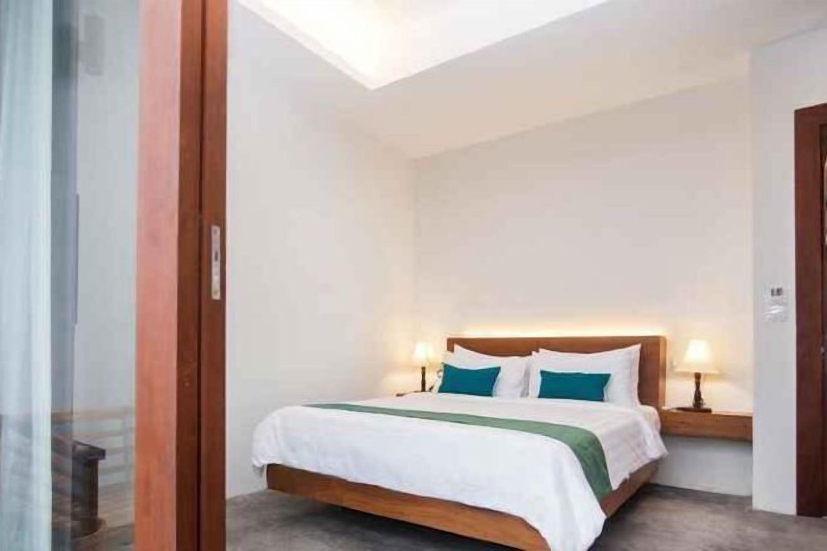 Luxe beddengoed, een minibar, een kluis op de kamer, een bureau