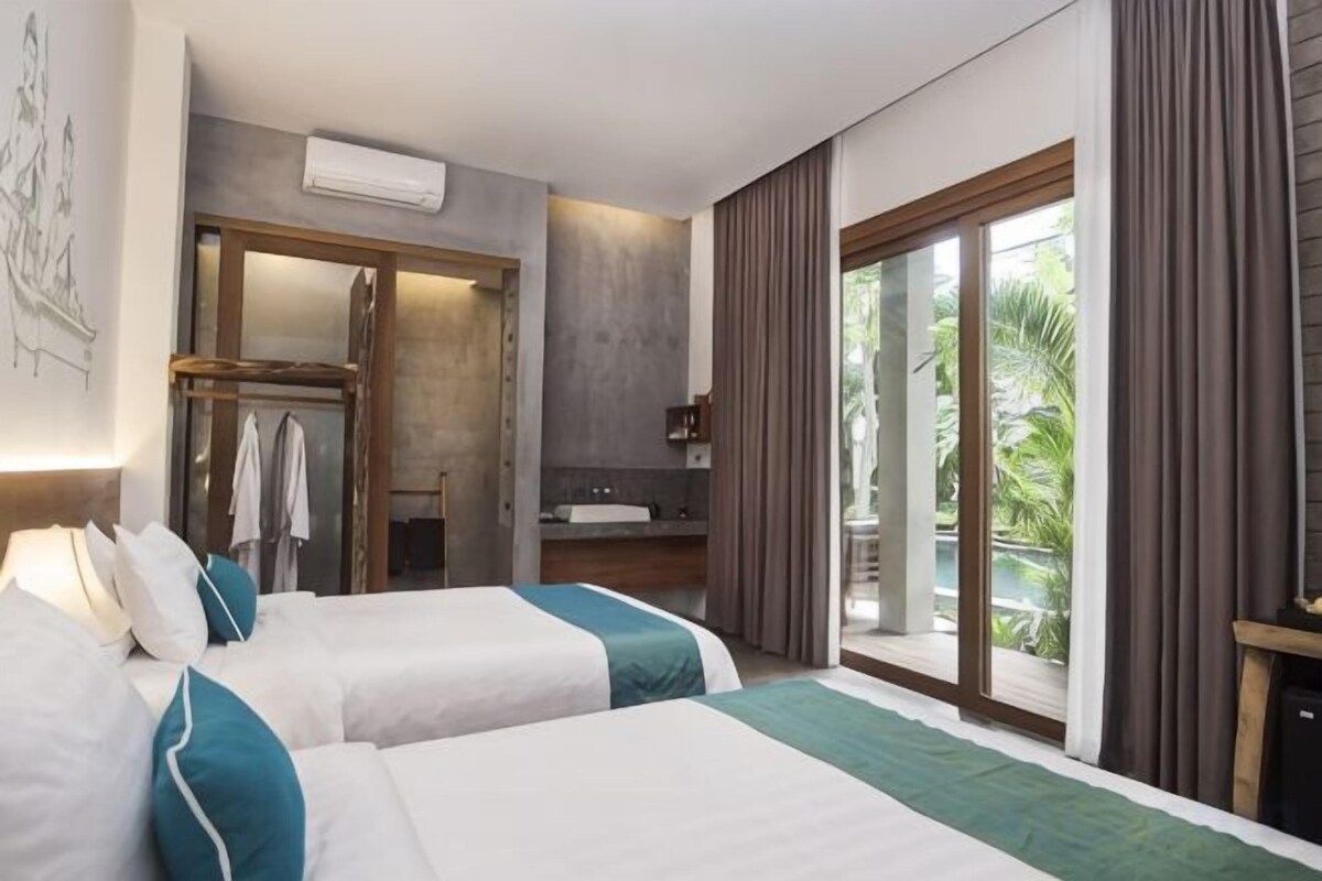 Ropa de cama de alta calidad, minibar, caja fuerte y escritorio