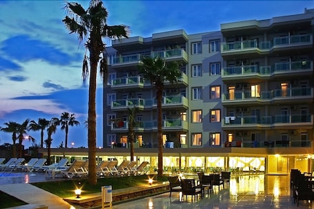 Front of property – evening/night. Grand Akca Hotel
