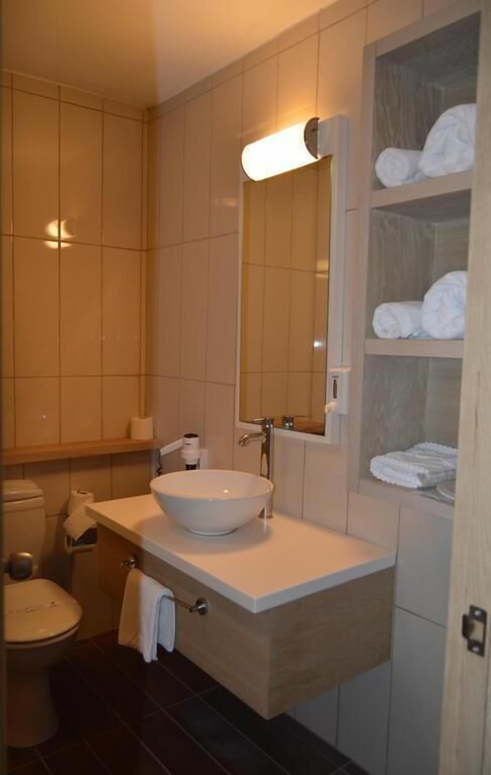 free toiletries, hair dryer, slippers, towels