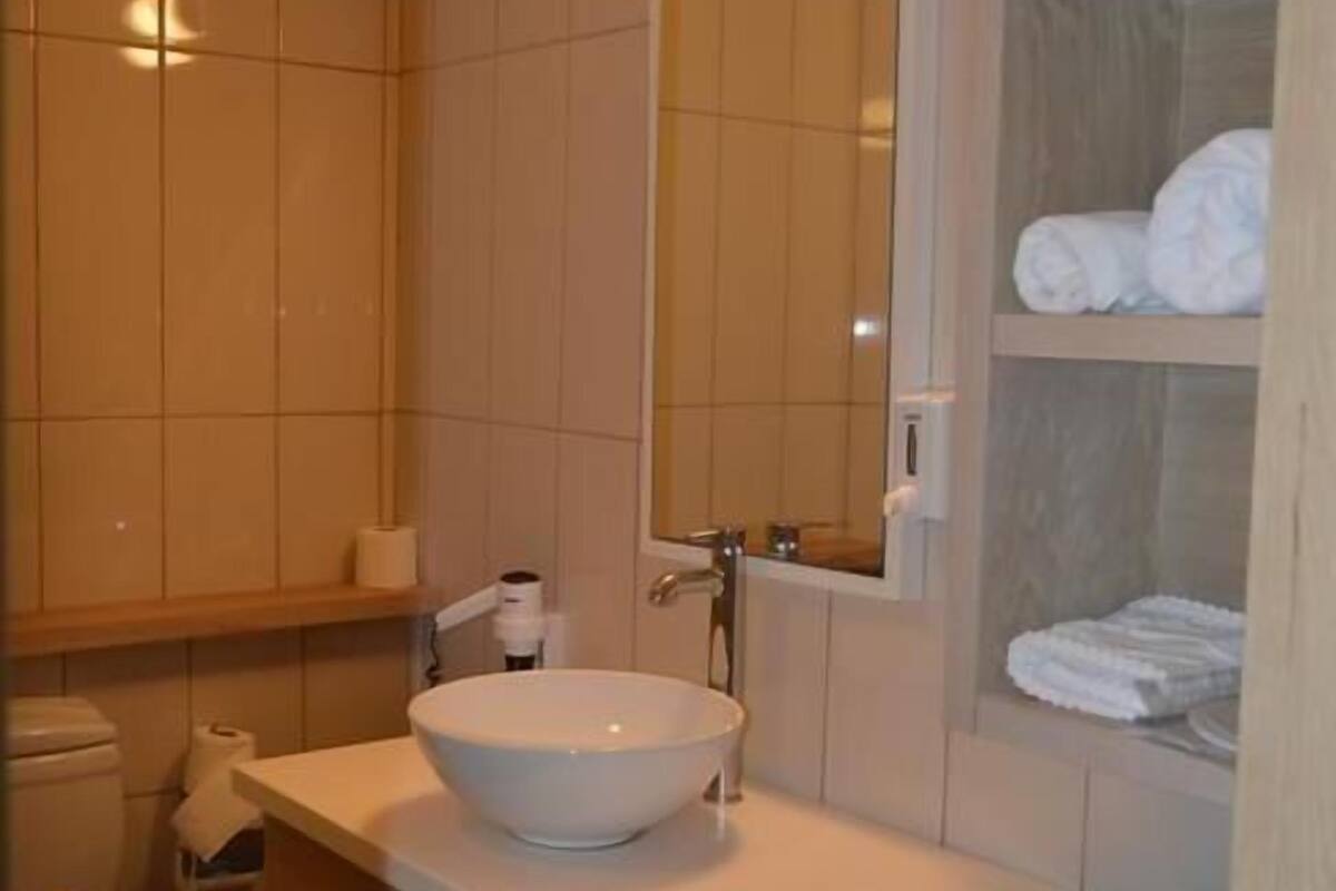 free toiletries, hair dryer, slippers, towels