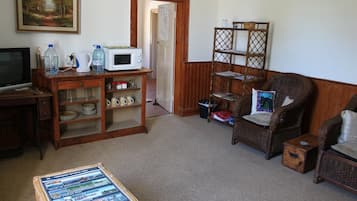 Fridge, microwave, electric kettle, cookware/dishes/utensils
