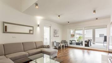 Luxury Penthouse, 3 Bedrooms, Terrace, Sea View (H7) | Living area | 55-inch LED TV with cable channels, TV