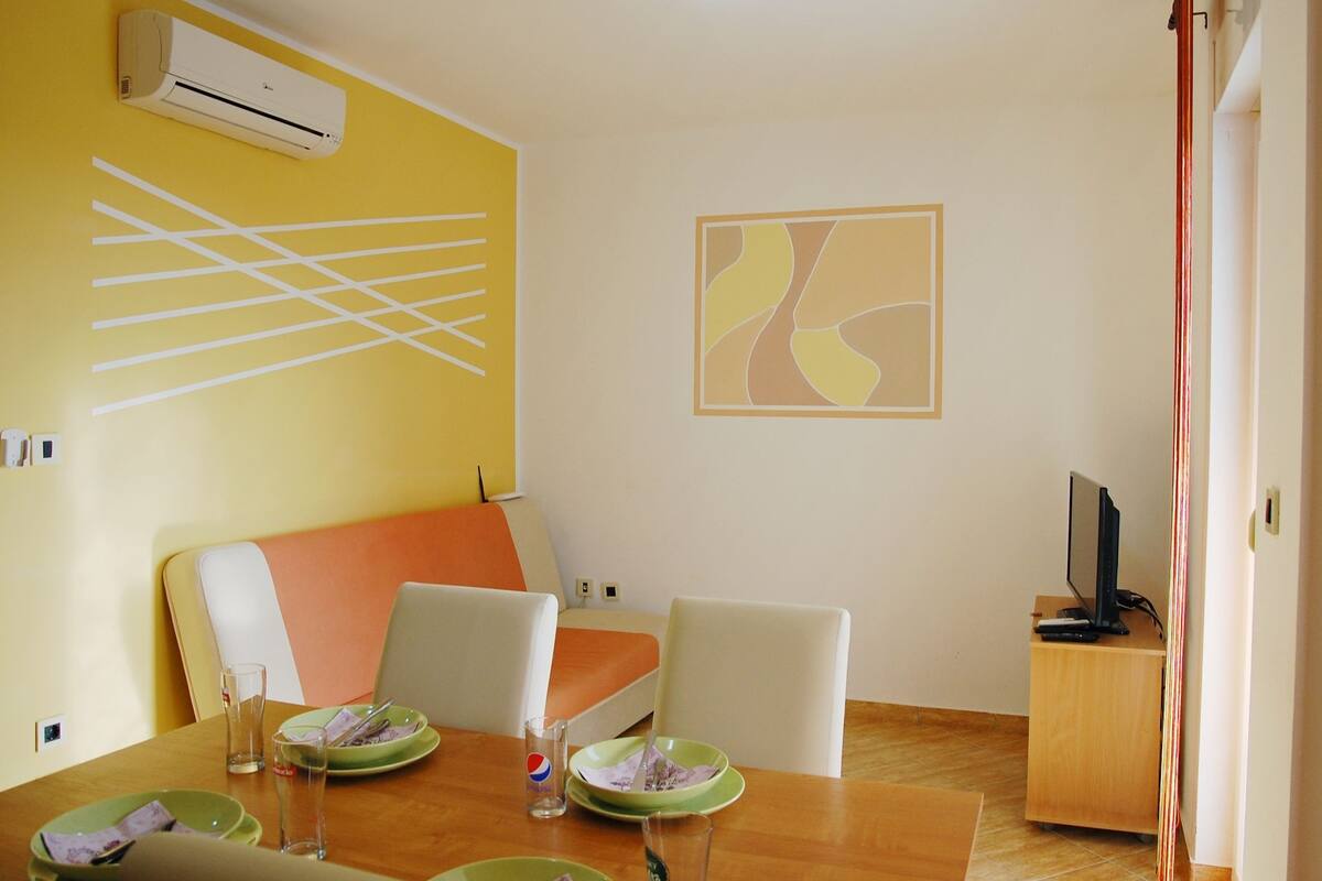 Apartamento, 2 quartos (A3) | Área de estar | TV