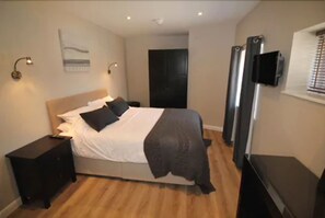 Premium bedding, desk, soundproofing, iron/ironing board