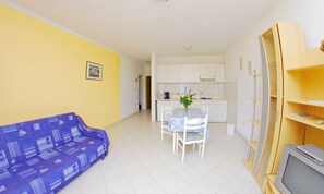 Apartment, Ground Floor (A2) | Living area | TV - Storia di Mare Apartments (Rasa)