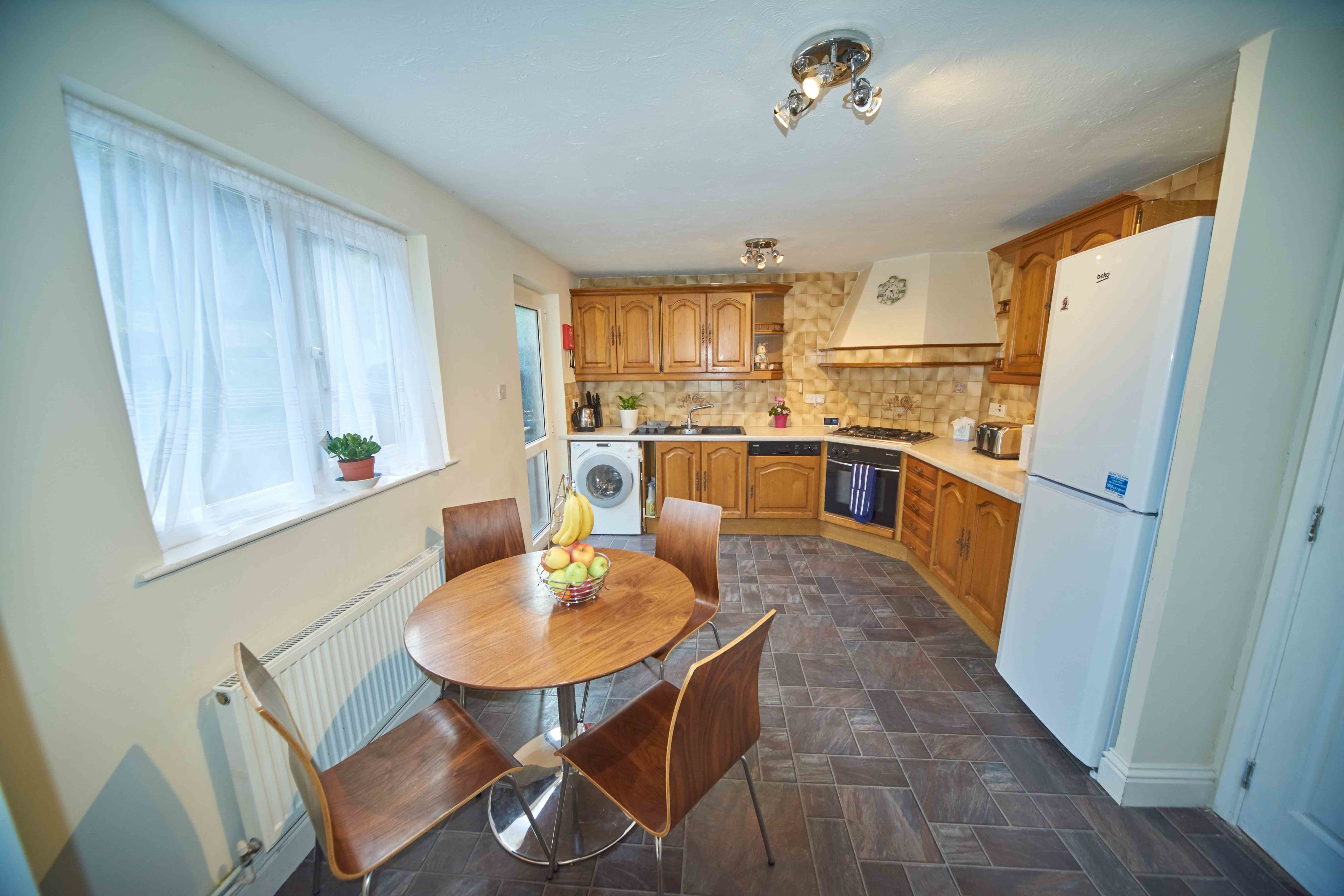 Ferienhaus, 4 Schlafzimmer, Küche, Gartenblick | Eigene Küche | Kühlschrank, Mikrowelle, Wasserkocher, Toaster