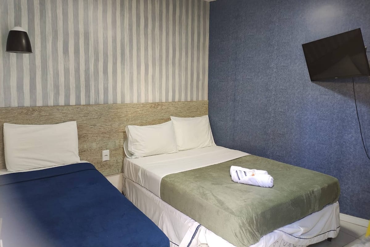 Suite monolocale Deluxe, 1 letto matrimoniale, cucina, vista giardino | Tende oscuranti, ferro/asse da stiro, Wi-Fi gratuito, lenzuola
