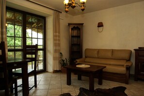 Grand-Doppelzimmer | Wohnbereich | Flachbildfernseher