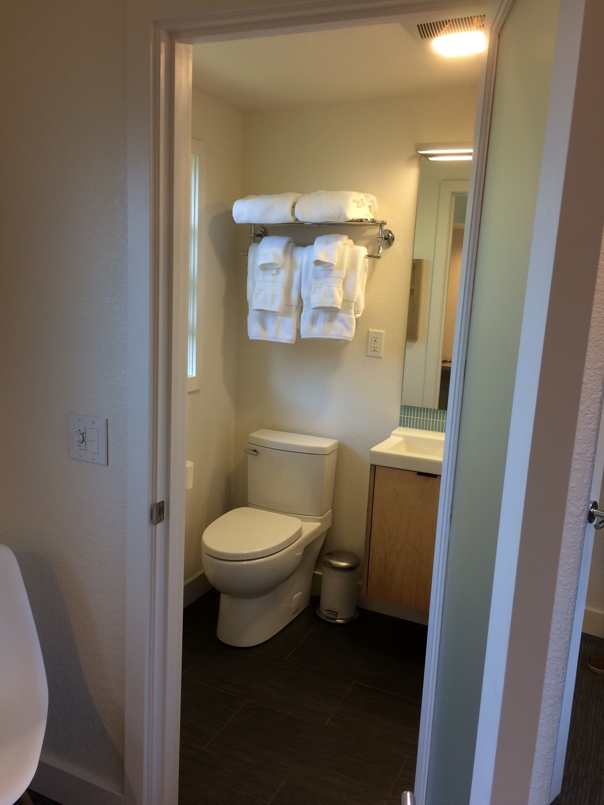 room, 1 queen bed, refrigerator | bathroom | shower, towels