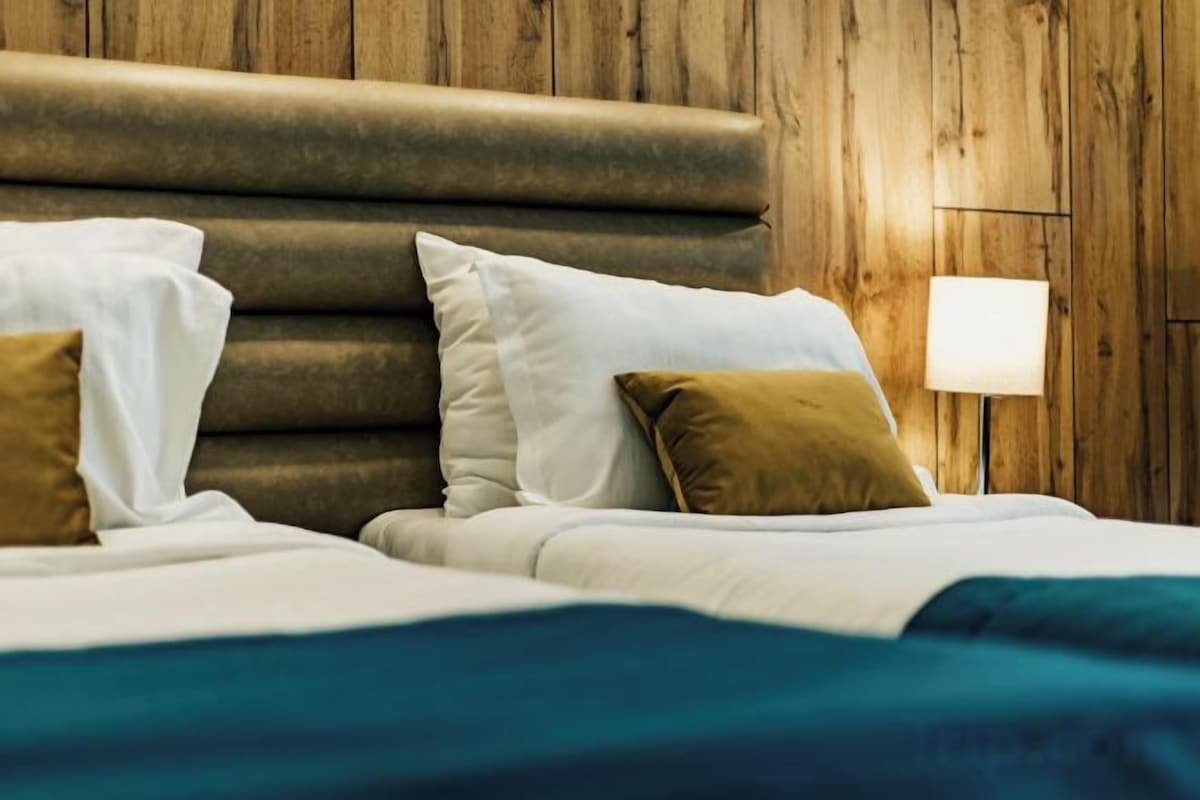 Premium bedding, memory-foam beds, minibar, in-room safe