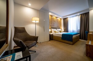 Premium bedding, memory-foam beds, minibar, in-room safe