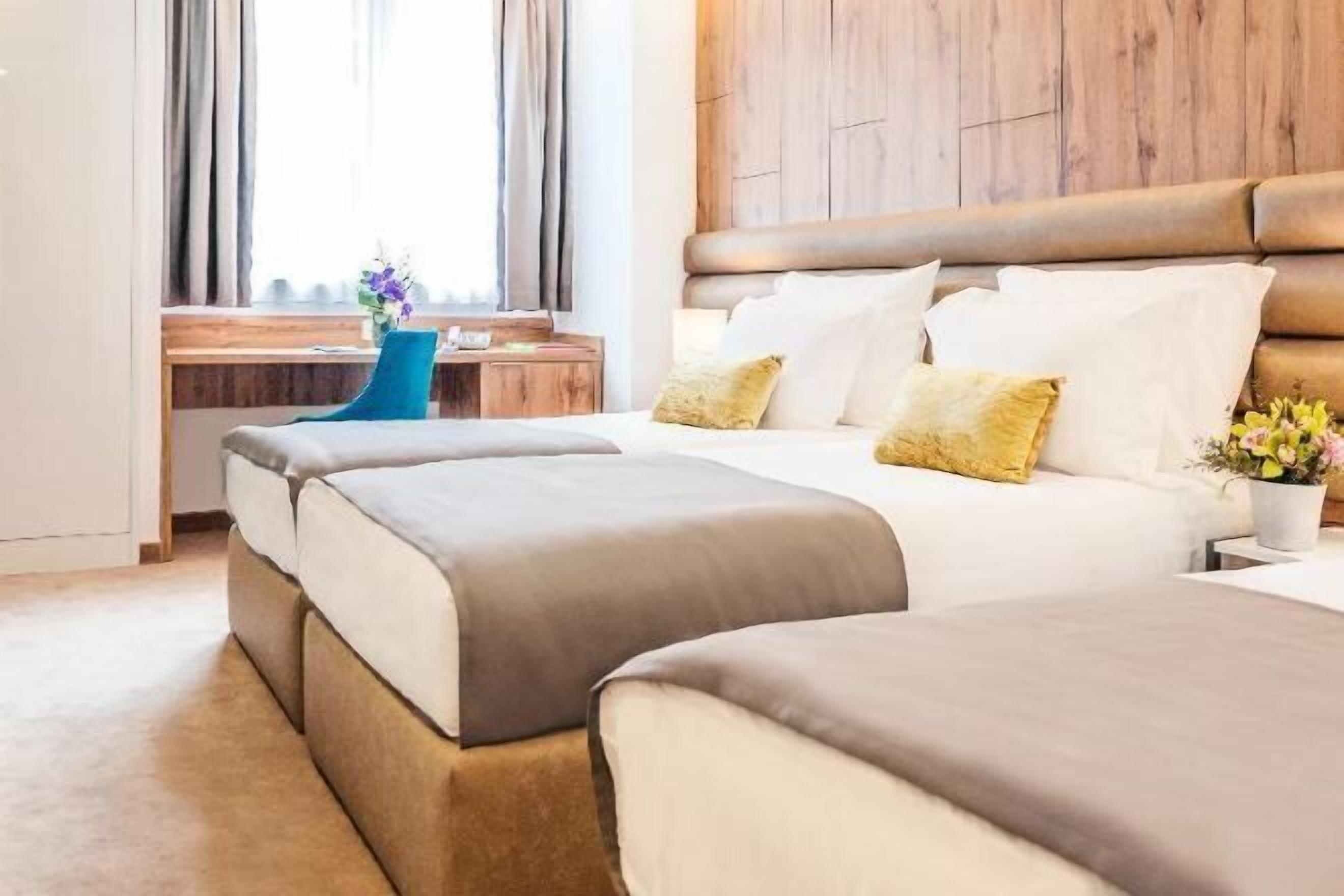 Premium bedding, memory-foam beds, minibar, in-room safe