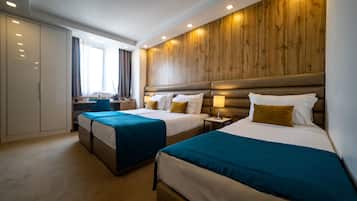 Habitación triple Elite | 1 habitación, ropa de cama de alta calidad y camas con efecto memoria
