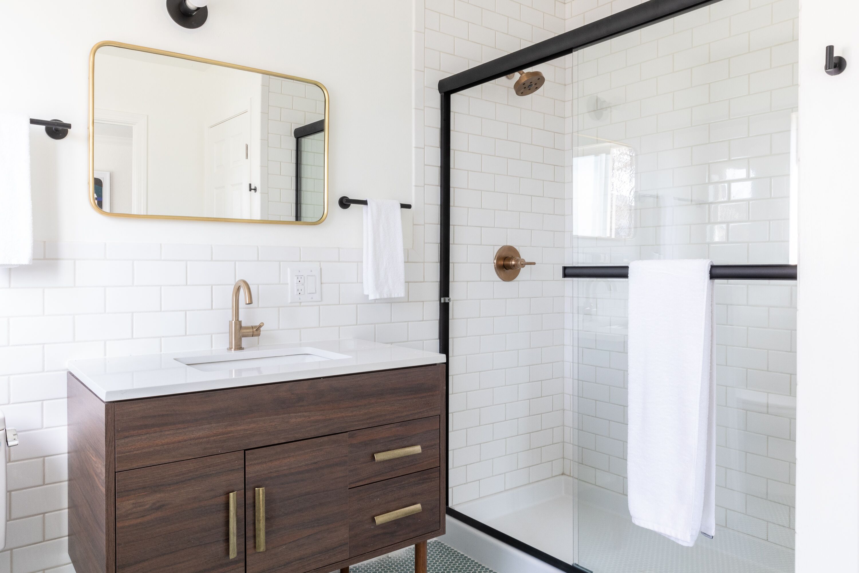 rainfall showerhead, hair dryer, towels, soap