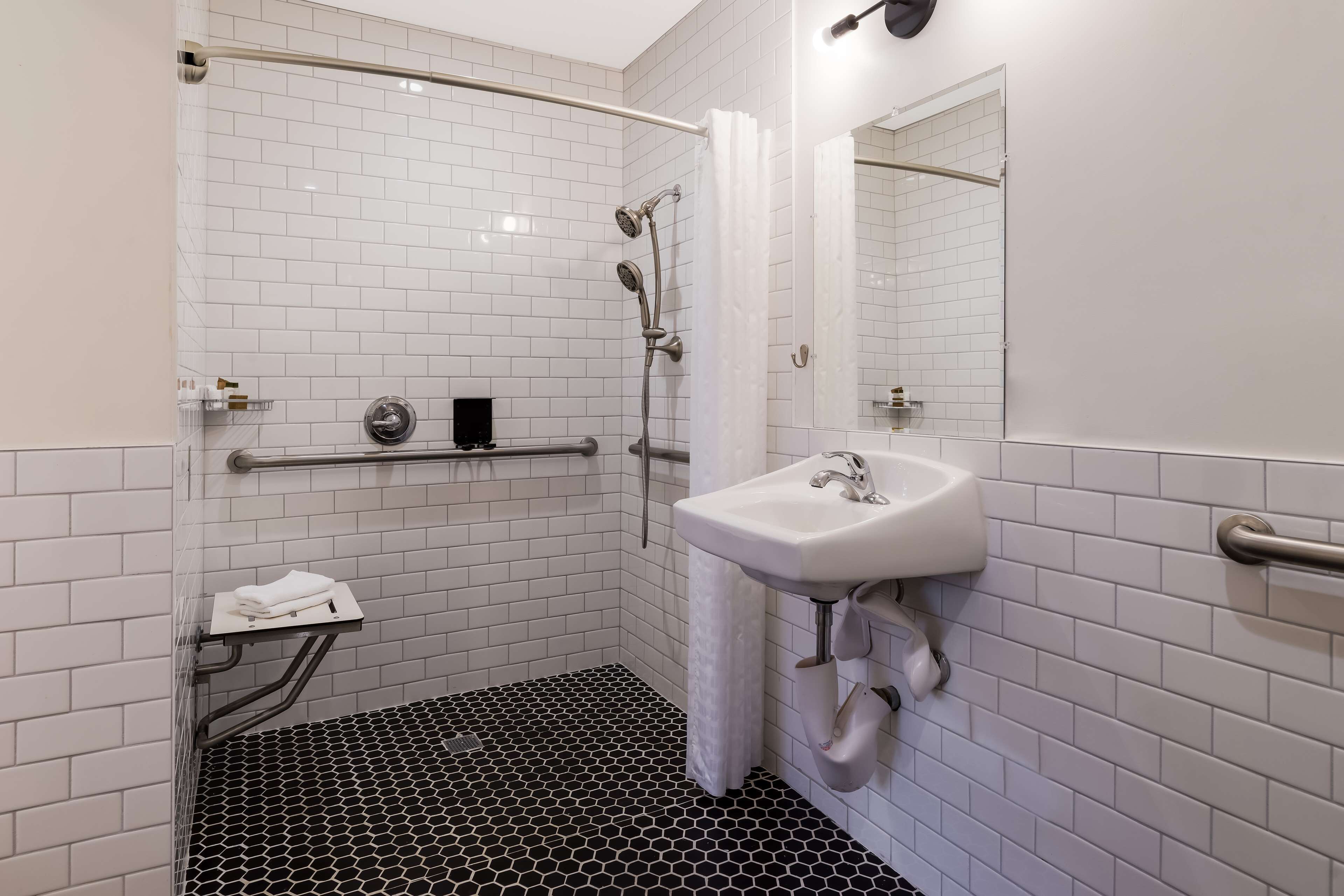 room, 1 queen bed, accessible, non smoking | bathroom | rainfall showerhead, hair dryer, towels, soap