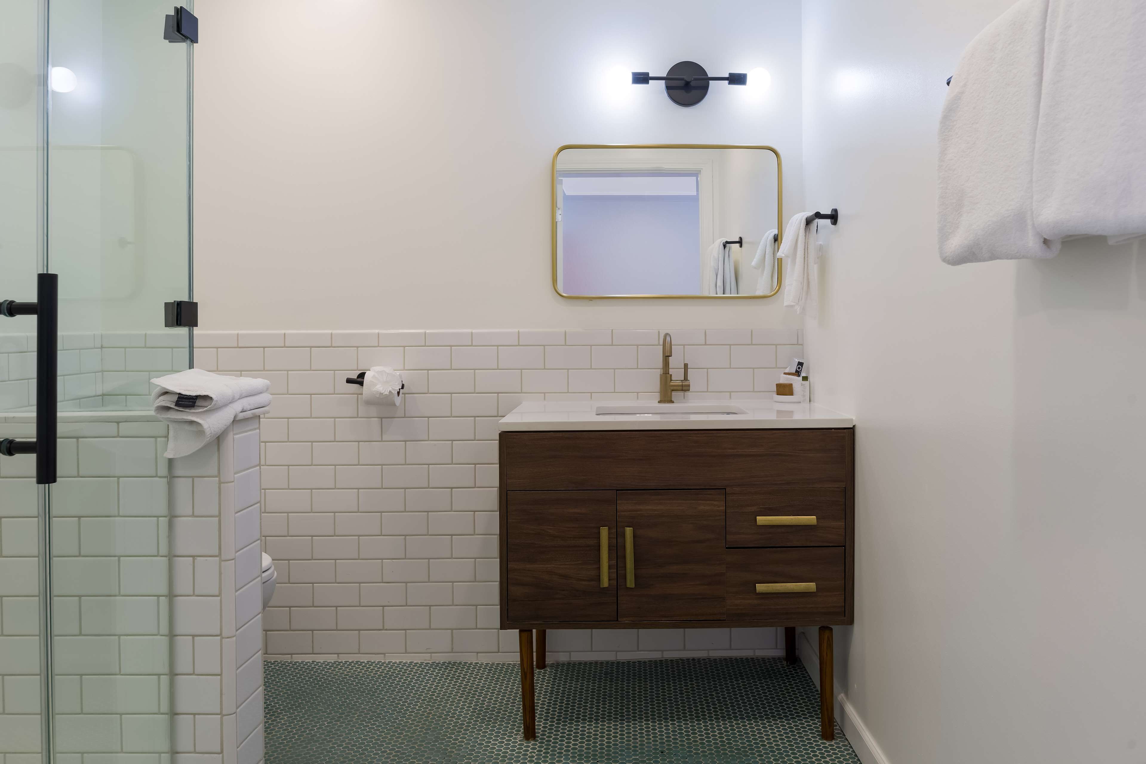 room, 1 king bed with sofa bed, non smoking | bathroom | rainfall showerhead, hair dryer, towels, soap