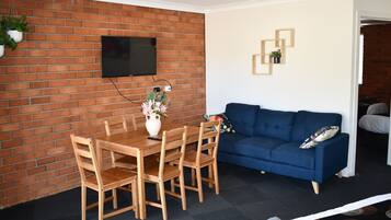 Standard Suite, 2 Bedrooms | Minibar, desk, laptop workspace, iron/ironing board