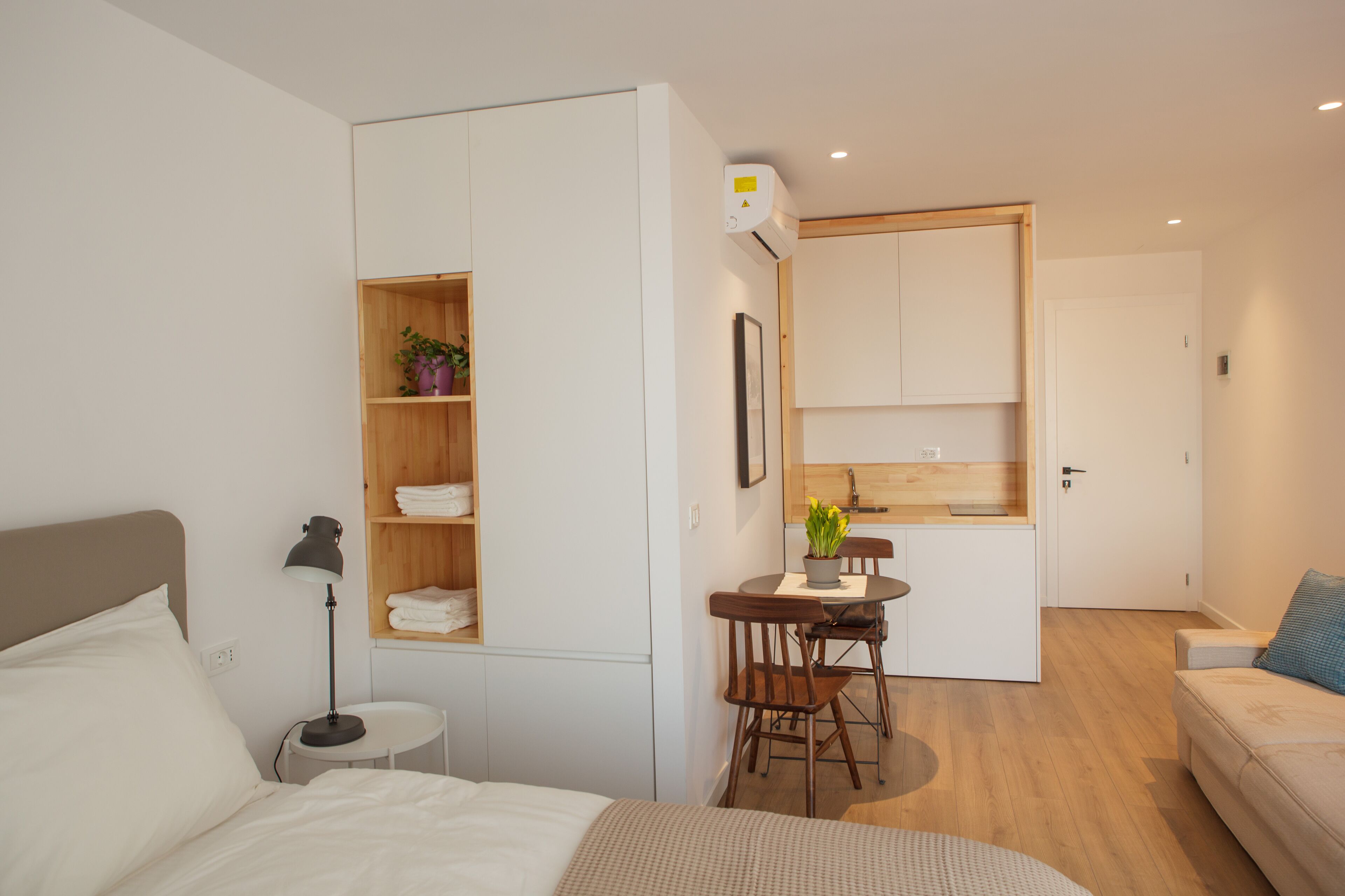 mini-fridge, electric kettle, toaster, cookware/dishes/utensils