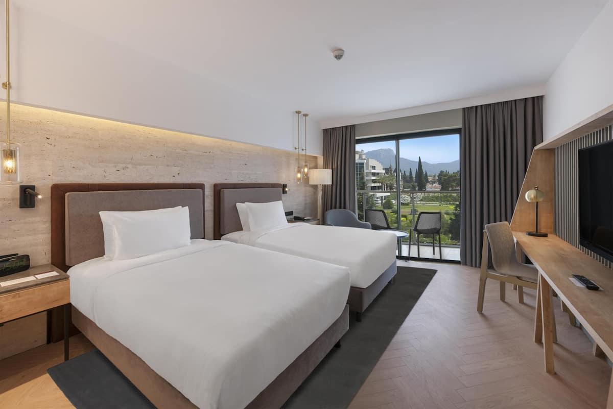 Twin Room | Down comforters, free minibar, in-room safe, desk