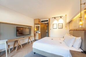 Down comforters, free minibar, in-room safe, desk