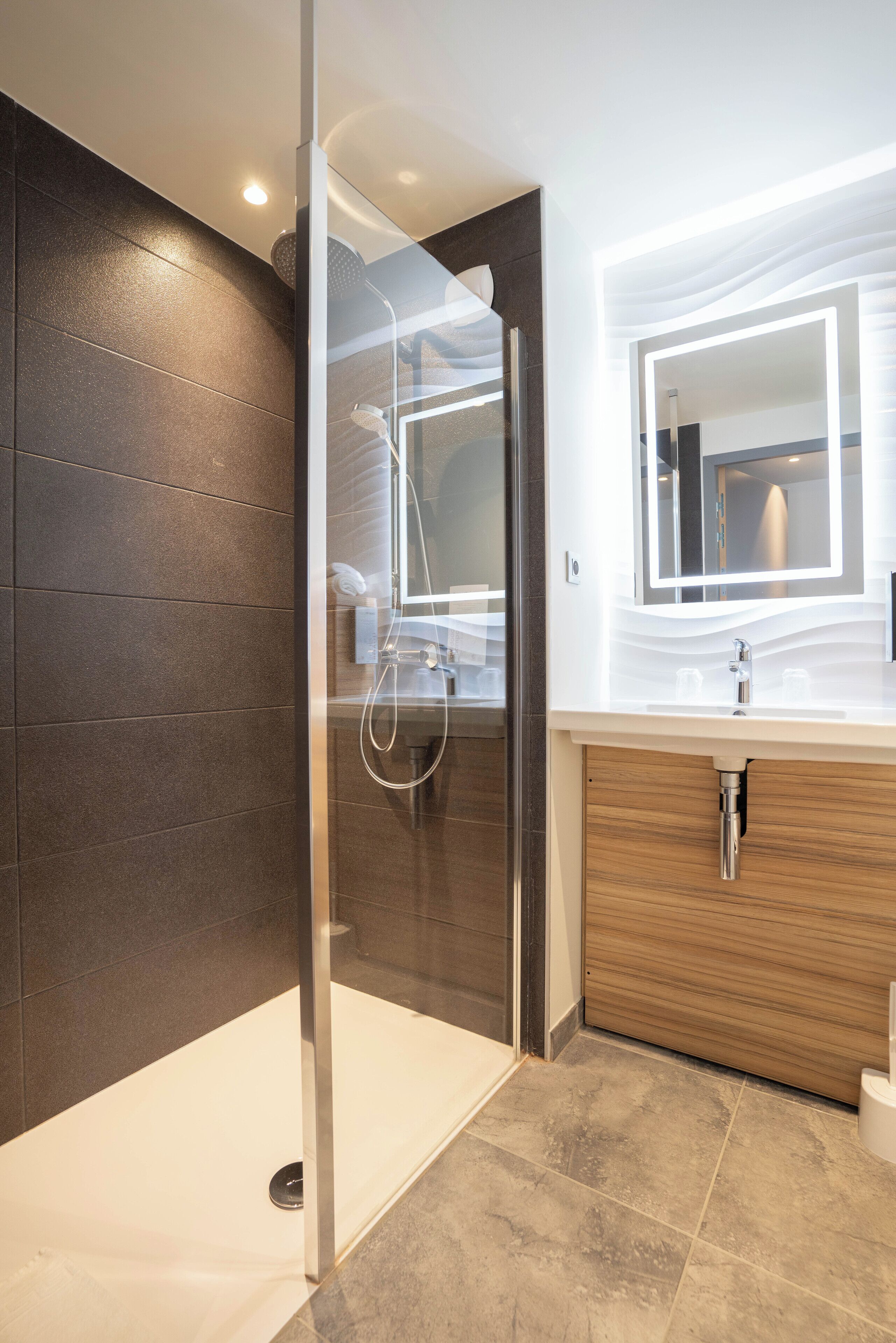 shower, eco-friendly toiletries, hair dryer, towels