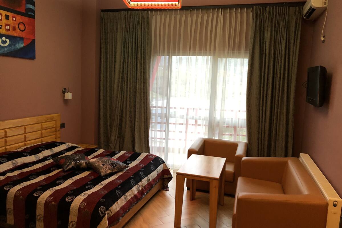 standard double room, 1 king bed, balcony, valley view | premium bedding, desk, soundproofing, iron/ironing board